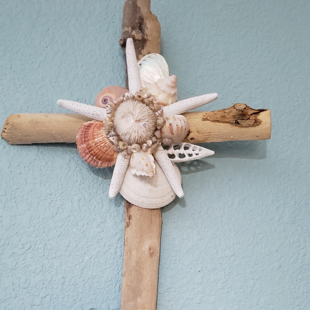 Cross embellished with shells and starfish. Handma